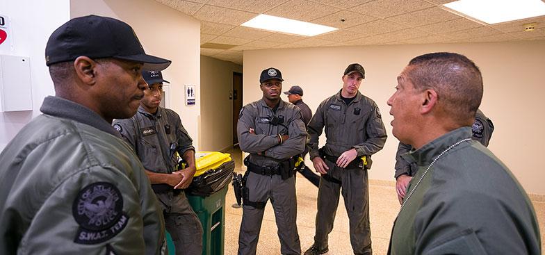 members of the  Public Safety department in a discussion 